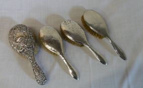4 silver handled hairbrushes