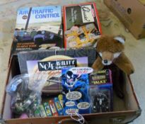 Suitcase of vintage games, figures etc