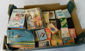 Assorted playing/game cards & Ladybird books