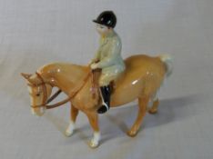 Beswick figure of a Palomino pony & young boy rider