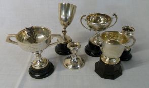 Silver trophies, candlestick etc