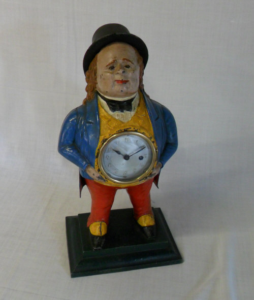 Cast iron clock man 41cm high