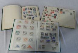 2 Stamp albums and a stock book of world stamps