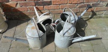 4 watering cans