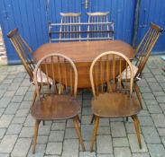 Ercol dining table & 4 Ercol goldsmith chairs with seat pads, 2 Ercol chairs & a Ercol plate shelf