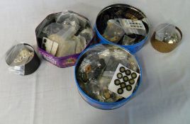 Tins of assorted buttons