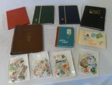 Various stamps, albums and a post card album (empty)