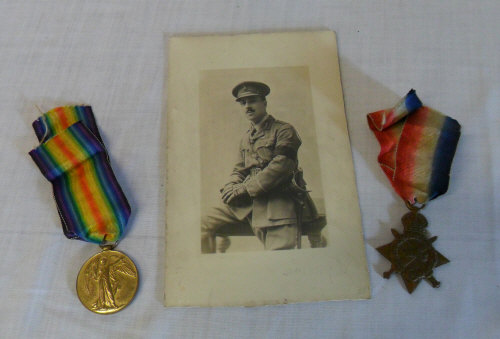 Victory medal & 1914-15 star to L-12023 B.O.M SJT H Milner R.A and a picture of a soldier