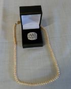 14ct gold ring & string of pearls