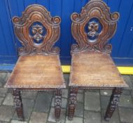 Pr of Vict/Edw carved oak hall chairs