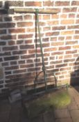 Wrought iron & stone garden roller