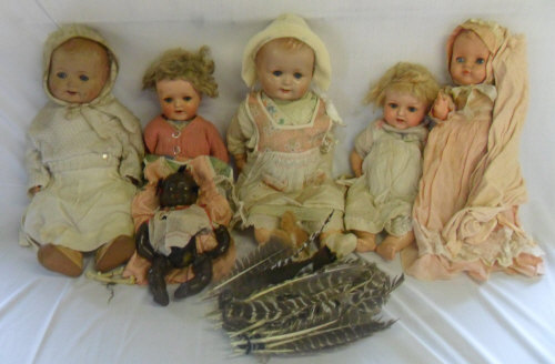 6 old dolls, some marked Germany (with suitcase)