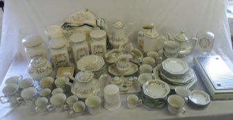 2 lg boxes full of 'Eternal Beau' crockery inc plates, bowls, cups, tea/coffee/sugar canisters etc