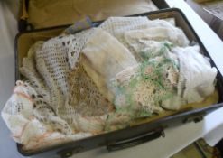 Suitcase of assorted fabrics / materials