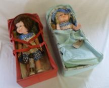 2 old dolls in carry cots