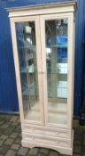 Tall modern display cabinet with glass shelves