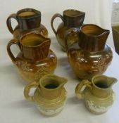 7 stoneware jugs (6 pictured)