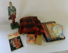 Tartan kilt, books/maps on Scotland & a Scottish figure etc