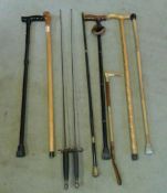 2 fencing foils & various walking sticks etc