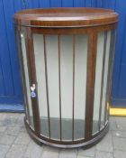 1930s bow fronted display cabinet with glass shelves