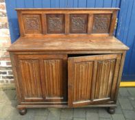 Sideboard with linen fold door & carved back panel