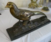 Bronze figure of a Pheasant on a rectangular marble base, signed R Pollin