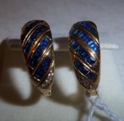 18ct gold sapphire earrings.  No hallmark.  Foreign 750 stamp