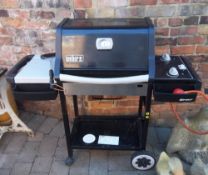 Weber gas BBQ with cover