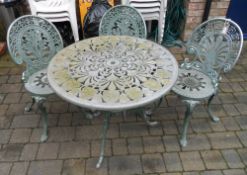 Green cast metal patio table & 3 chairs