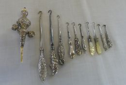 7 Silver button hooks, silver rattle (af) & 3 S.P button hooks, total Approx weight 4oz,
Birm,