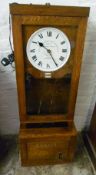 'The Glenhill-Brook Time Recorder Ltd' clocking in device in an oak case converted to a clock