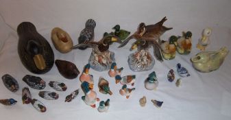 Sel of ceramic & wooden duck figurines