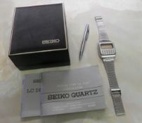 Seiko quartz digital type Cal. C153 calculator watch with stylus, manual & original box