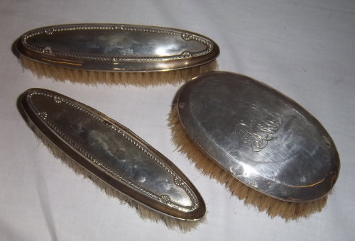 3 silver dressing table brushes