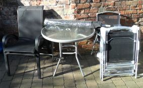 Garden furniture comp of 4 folding chairs, 2 stacking chairs, glass top table & parasol