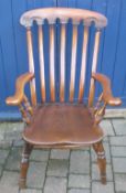 High back country chair with elm seat & carved head rest