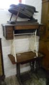 2 Singer treadle sewing machine tables (one missing machine) & blacksmith bellows