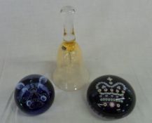 Caithness glass bell and 2 Caithness glass paperweights