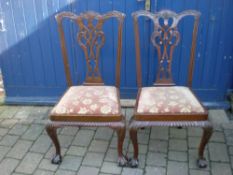 2 Chippendale repro dining chairs