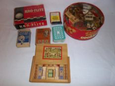 Child's boxed building blocks, wooden village, card games, etc