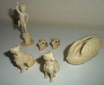 Ivory swan, pr of dogs, cherub and 2 cattle heads