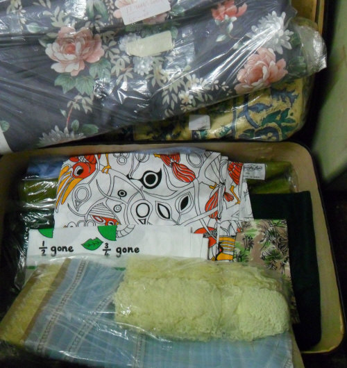 Suitcase of modern fabrics, baize, trimming, etc