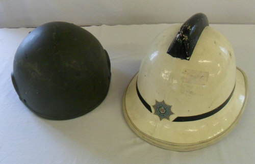 White fireman's helmet & one other helmet