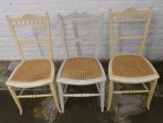 Pr of cream coloured cane seated chairs & one other