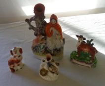 4 Staffordshire figures inc a Little Red Riding hood spill vase