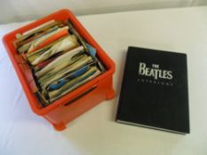 Box of singles & The Beatles Anthology book