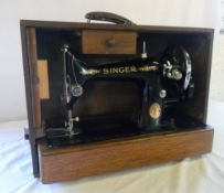 Singer sewing machine with case