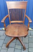 Early 20th C wooden swivel chair