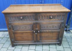 Carved oak sideboard