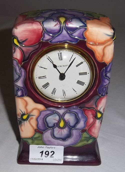 Moorcroft clock with flower design, dated '93 on base, ht approx 16 cm